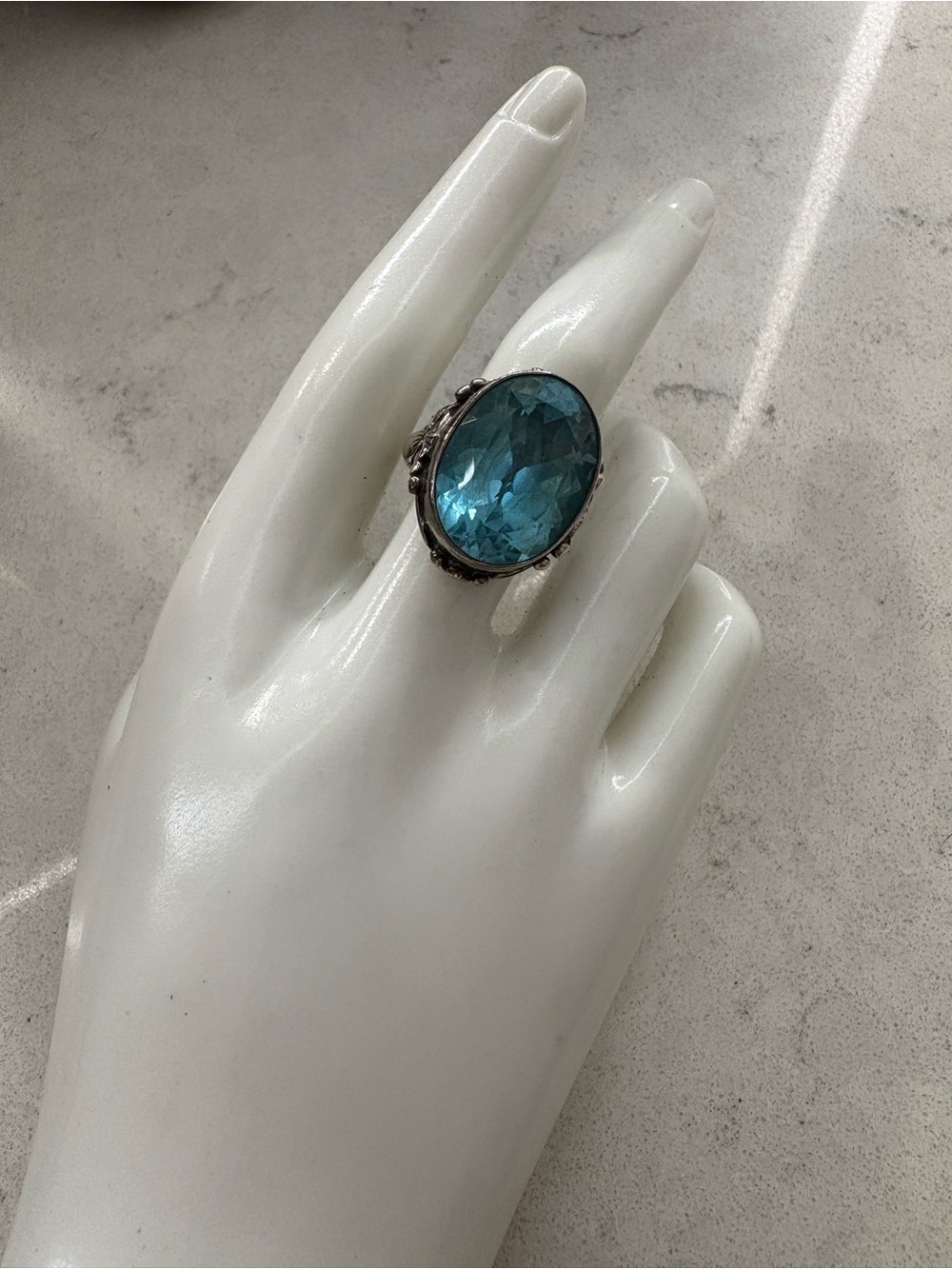 Sterling Silver Ring with Large Blue Gemstone and Flower Accents - Size 8.25